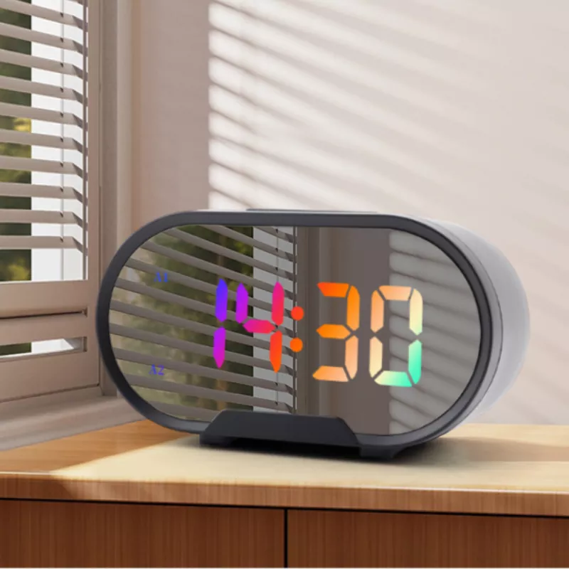Reloj despertador colorido con espejo elíptico